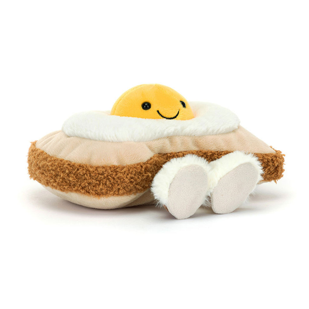 Oliver Egg On Toast Amuseables plush toy breakfast food themed character. Soft plush material safety embroidered face sunny side up egg design. Educational emotional comfort toy for children imaginative play kitchen adventures. Perfect gift for food lovers birthday morning presents collectible Amuseables. Machine washable premium hypoallergenic materials developmental toy for emotional intelligence. Amuseables food collection huggable design playful companion breakfast theme soft texture.