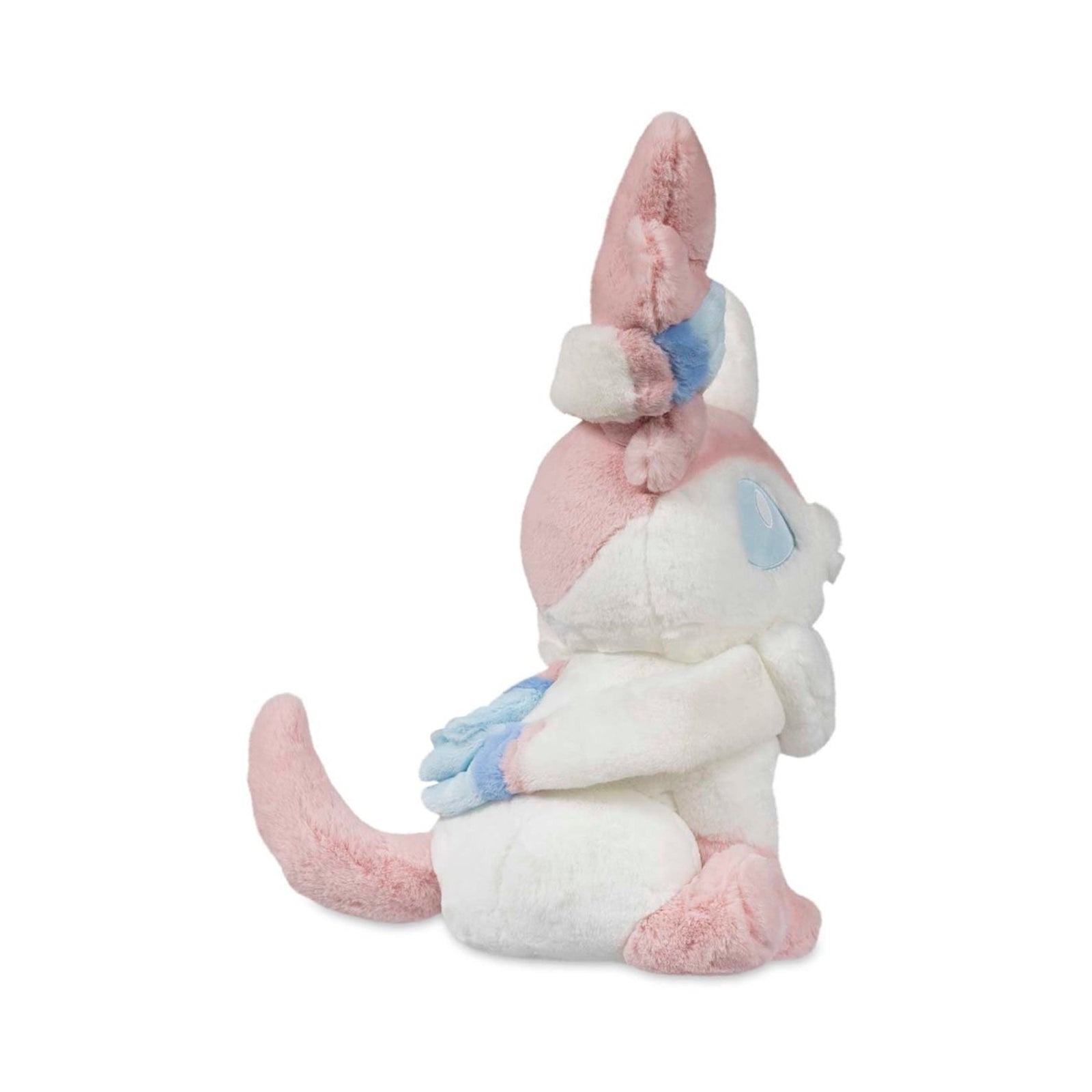 Sylvia Sylveon Comfy Friends plush officially licensed Pokémon Eevee evolution stuffed animal. Ultra-soft premium chenille fabric cloud-like texture sensory comfort toy. Pastel pink coloring safety embroidered eyes perfect for emotional support anxiety relief. Comfy Friends collection limited edition Pokémon Center product. Best gift for Pokémon fans children adults birthday Christmas present. Huggable design soft stuffed toy collectible merchandise cuddling companion.